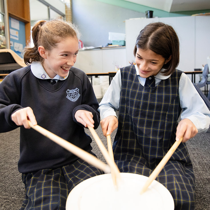 St Bernadette's Catholic Primary Castle Hill students enjoying drumming lesson