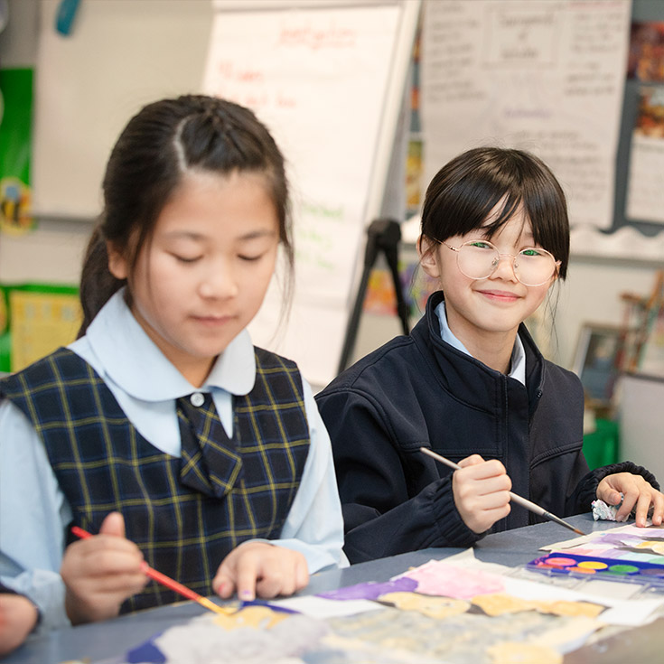 St Bernadette's Catholic Primary Castle Hill students paining in class